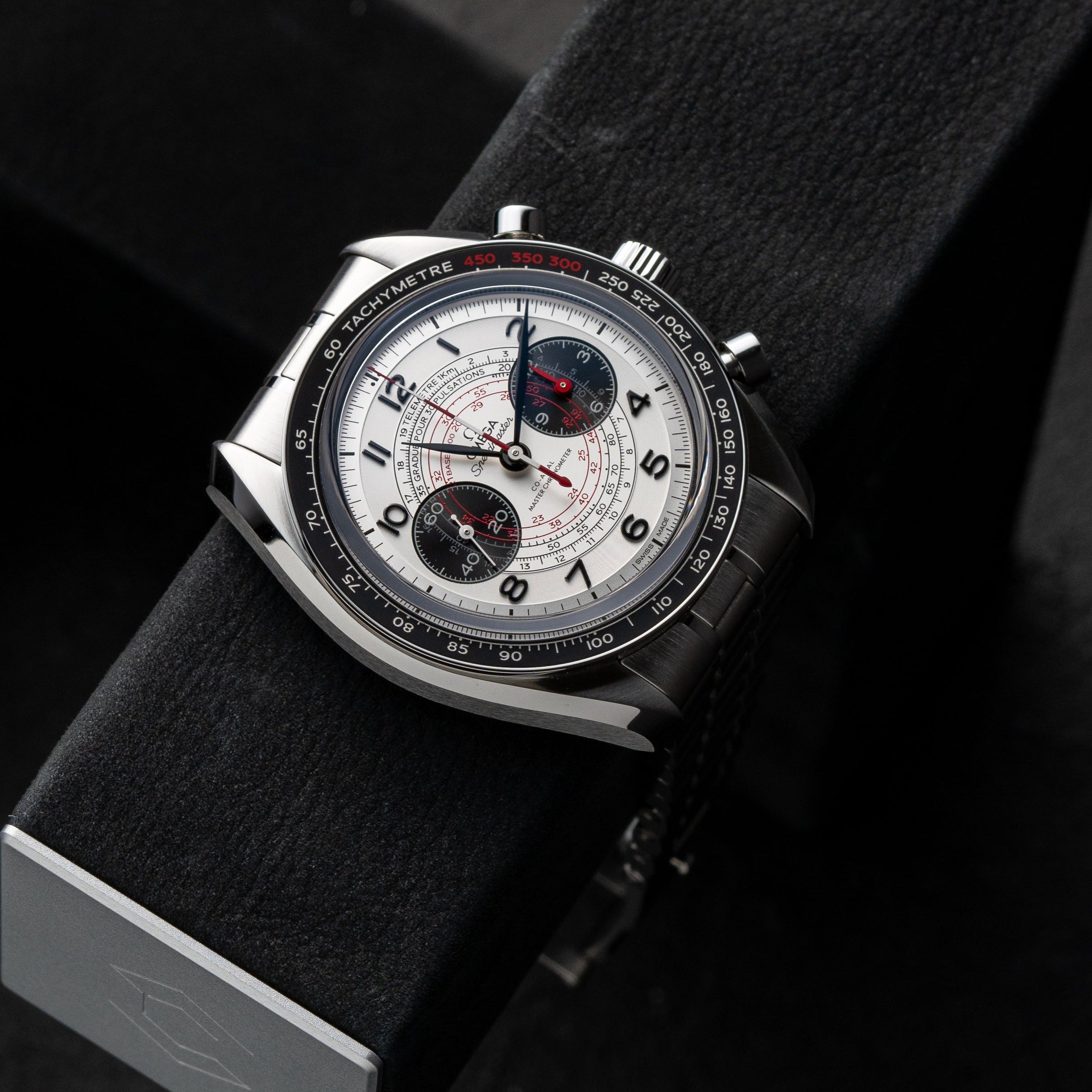 Authentic Omega Speedmaster Professional Chronoscope Chronograph on Charles Simon watch stand