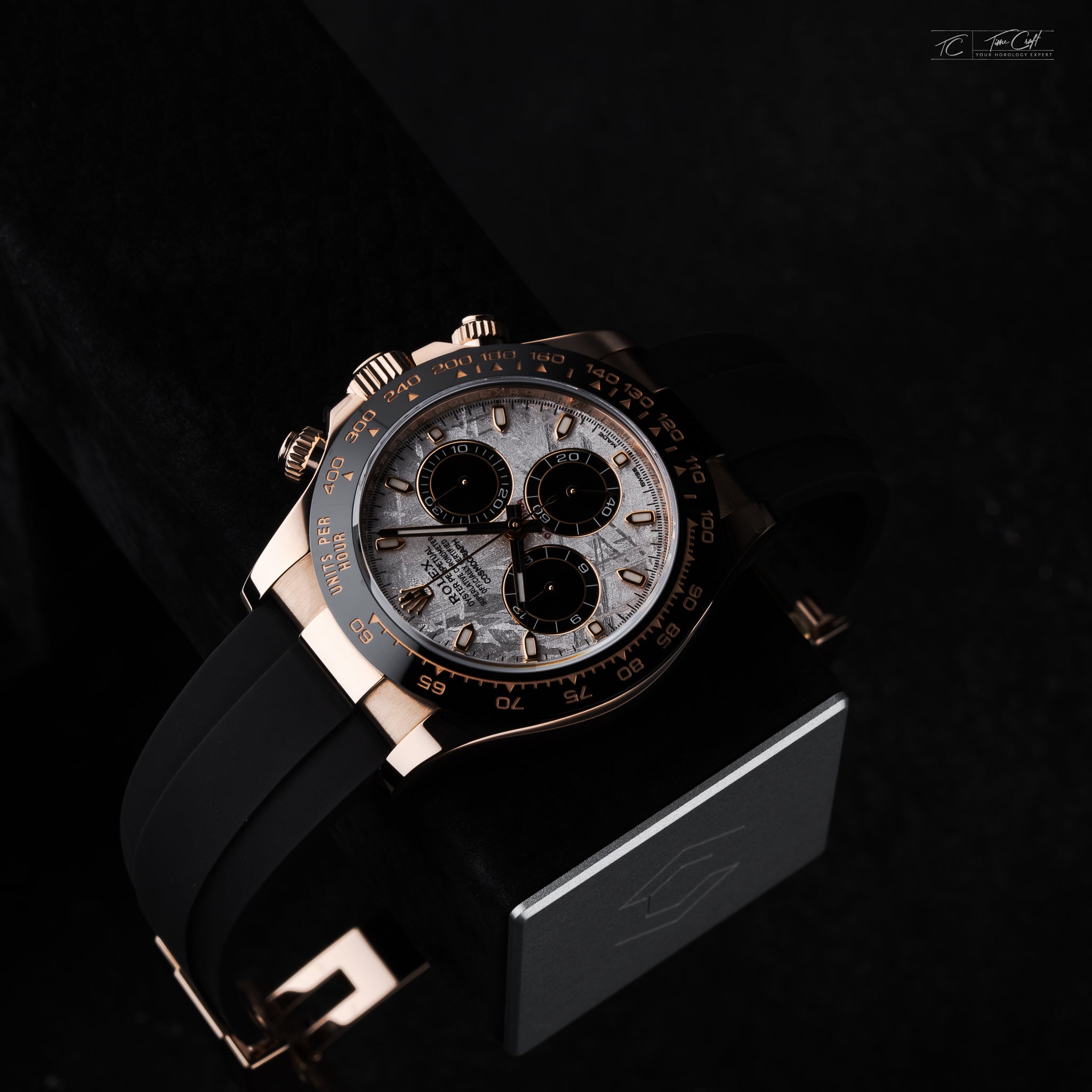 Authentic Rolex Daytona Rose Gold Meteorite Panda Dial Oysterflex Charles Simon Watch Stand
