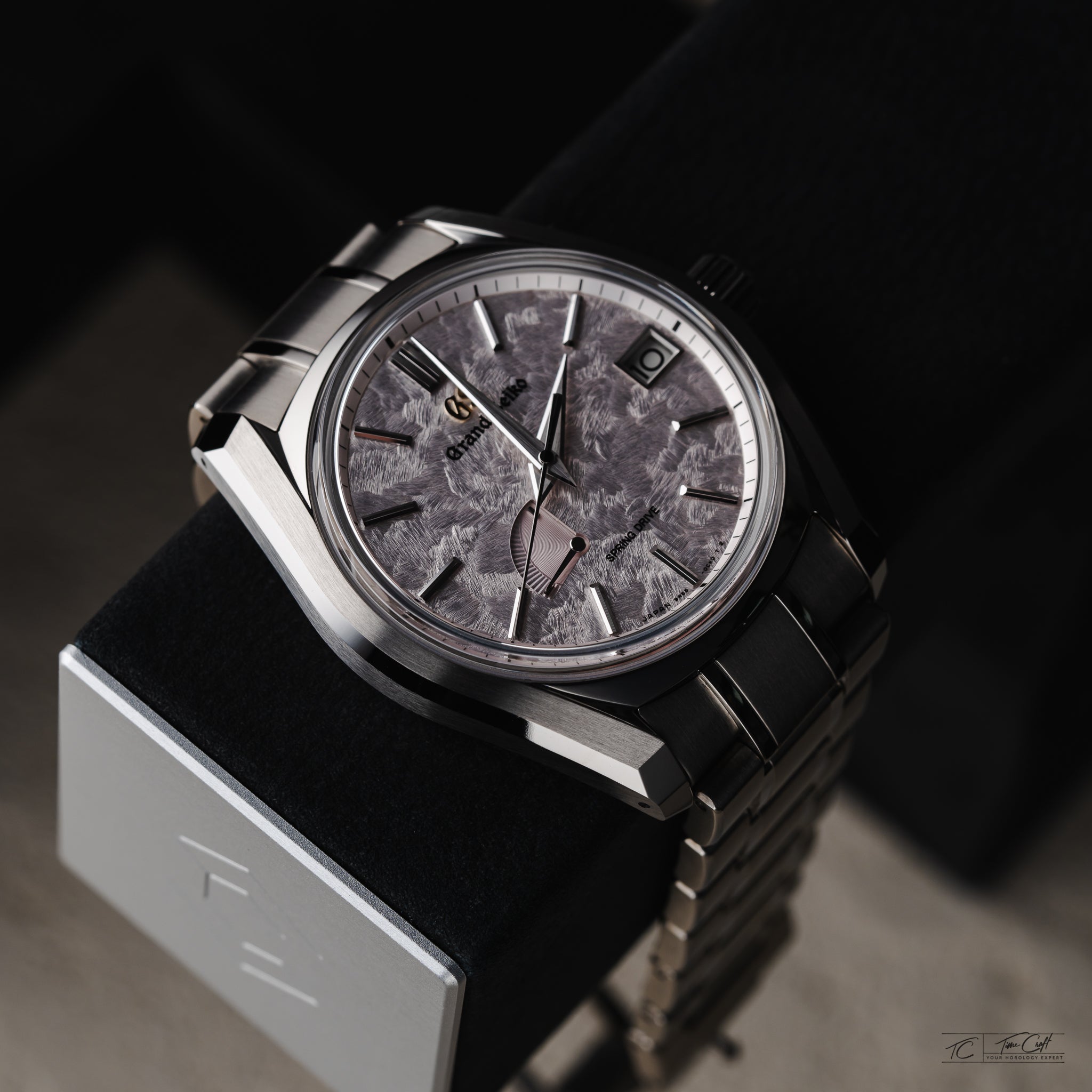 Authentic Grand Seiko Shunbun Spring Drive on Charles Simon watch stand